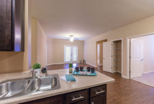 View of the living room at Stallion Pointe apartments in Everman, TX